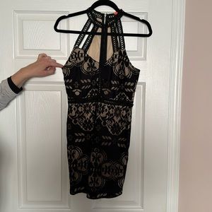 Boutique black and beige lace mini dress